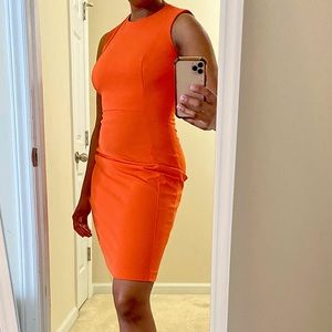 Orange knee length dress